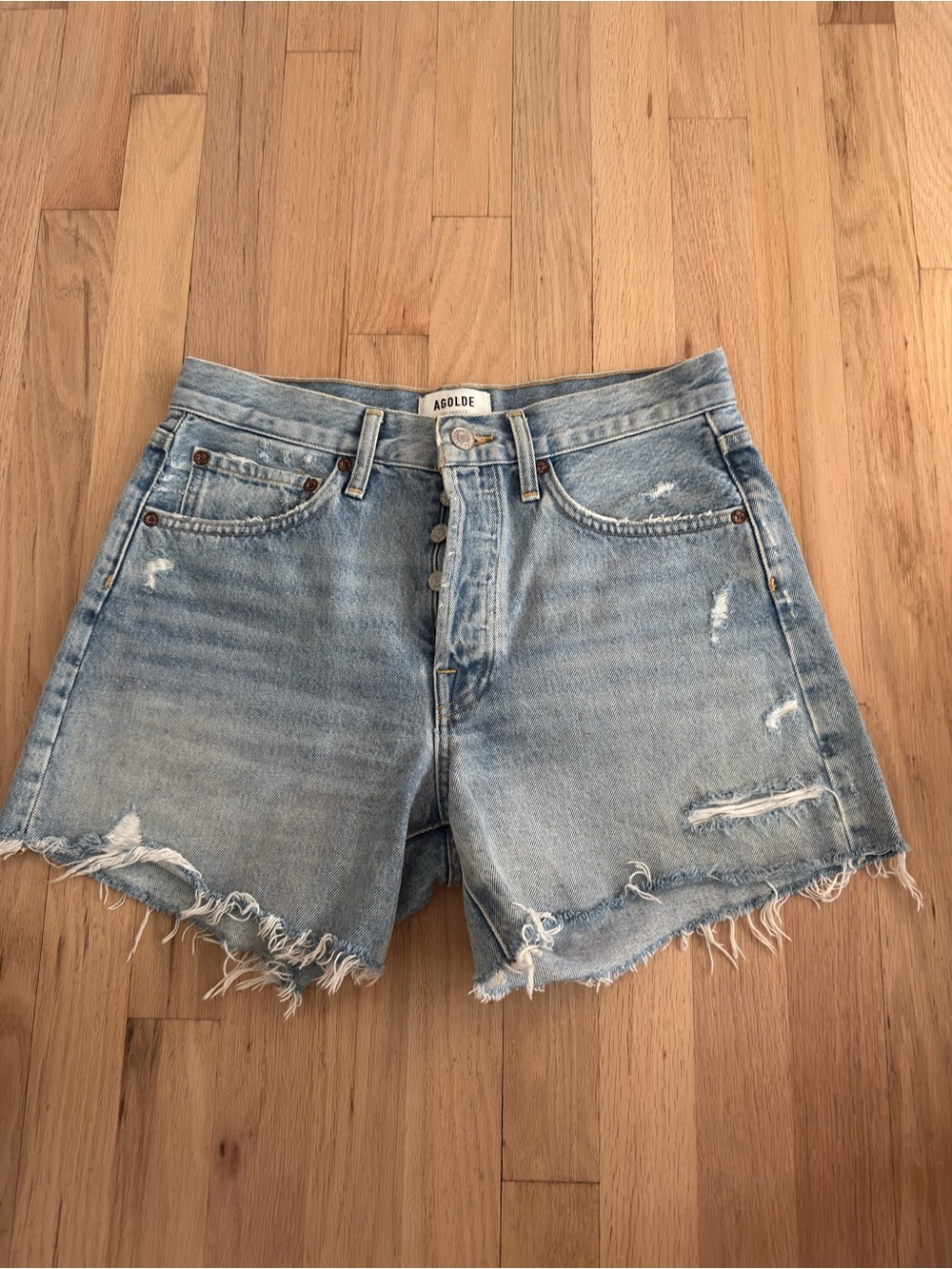 Agolde Light Wash Distressed Denim Cutoff Shorts